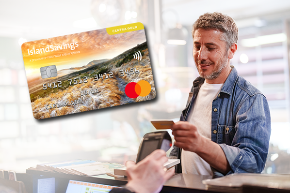 man holding a credit card ready to pay at the till